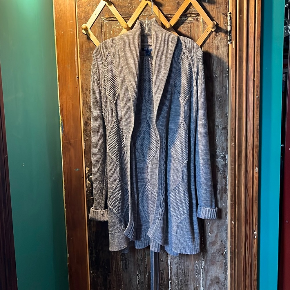 Knee length wrap around cable knit sweater